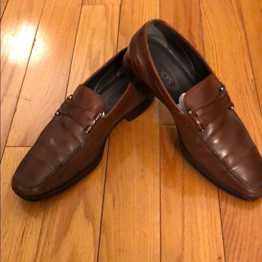 Tods men’s brown penny loafers